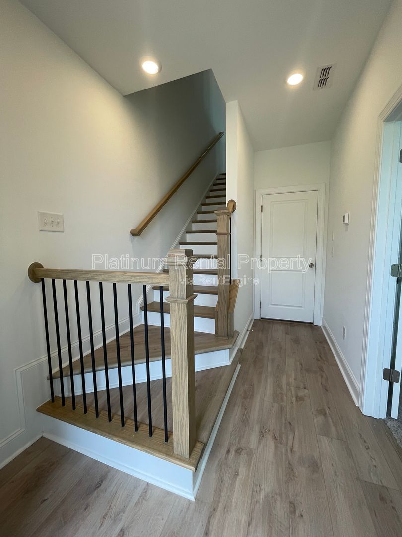 Meticulously maintained and better than new, 3 bedroom, 3.5 bathrooms in FANTASTIC gated Buford neighborhood, by Platinum Property Management Services, Inc. property image
