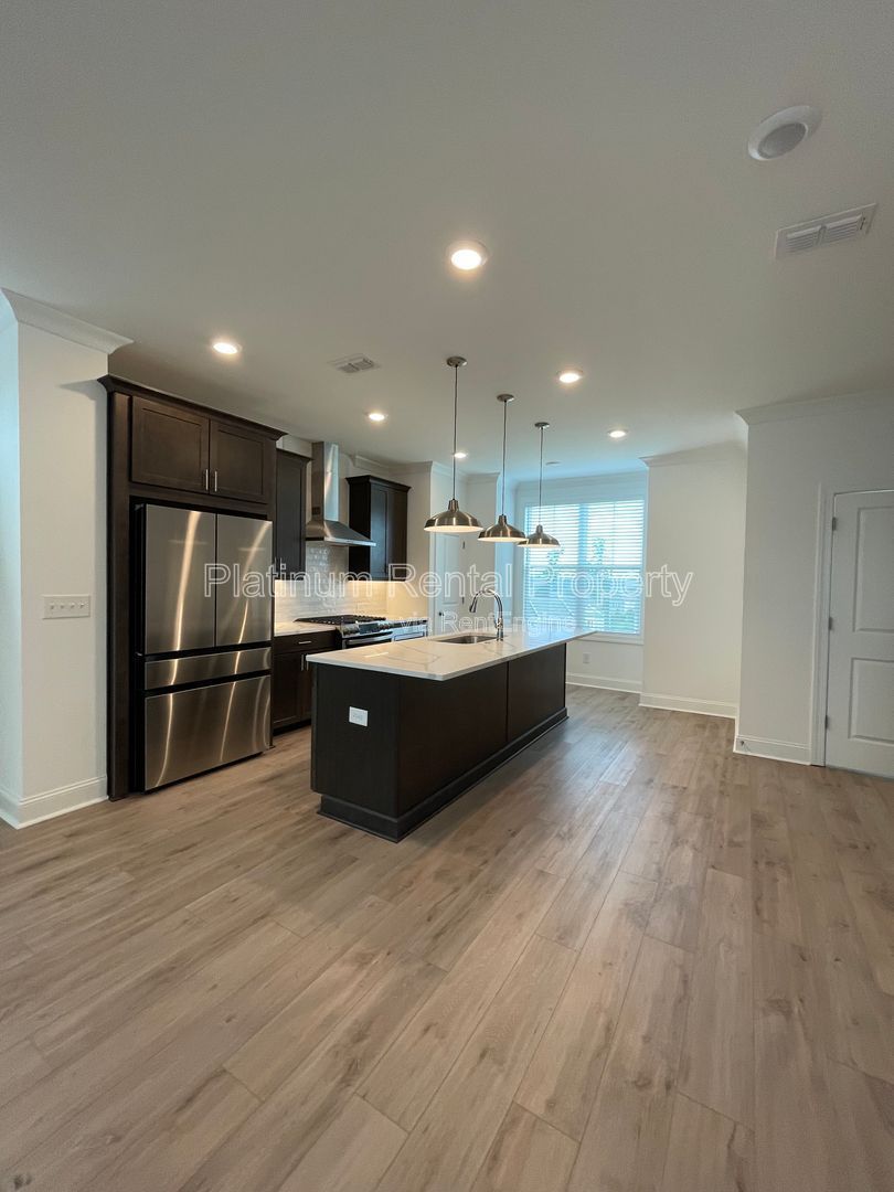 Meticulously maintained and better than new, 3 bedroom, 3.5 bathrooms in FANTASTIC gated Buford neighborhood, by Platinum Property Management Services, Inc. property image