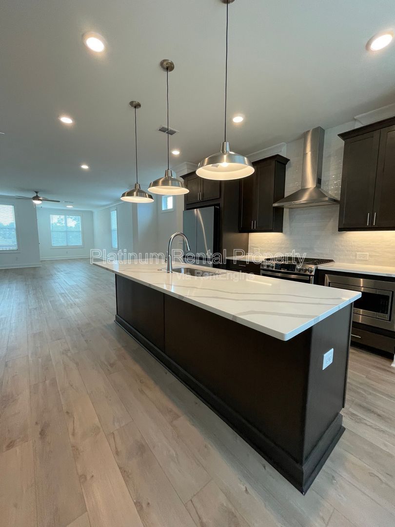 Meticulously maintained and better than new, 3 bedroom, 3.5 bathrooms in FANTASTIC gated Buford neighborhood, by Platinum Property Management Services, Inc. property image