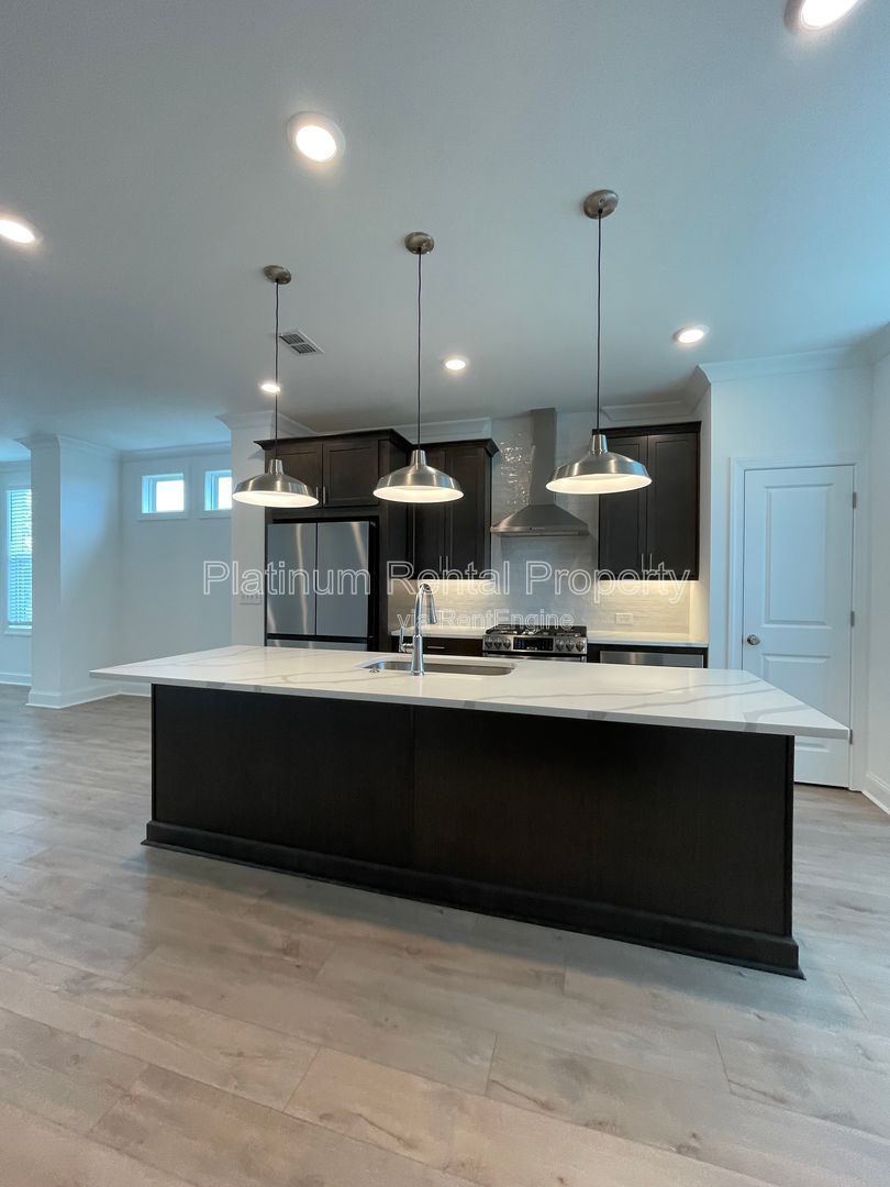 Meticulously maintained and better than new, 3 bedroom, 3.5 bathrooms in FANTASTIC gated Buford neighborhood, by Platinum Property Management Services, Inc. property image