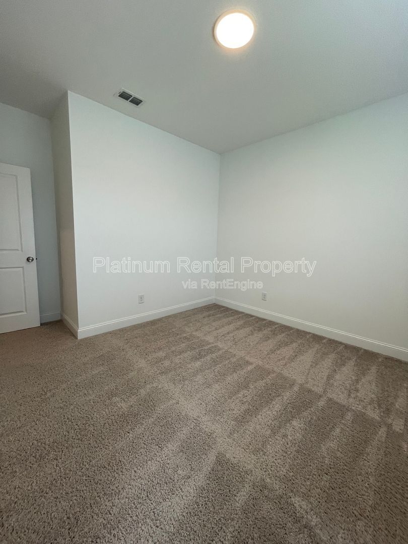 Meticulously maintained and better than new, 3 bedroom, 3.5 bathrooms in FANTASTIC gated Buford neighborhood, by Platinum Property Management Services, Inc. property image