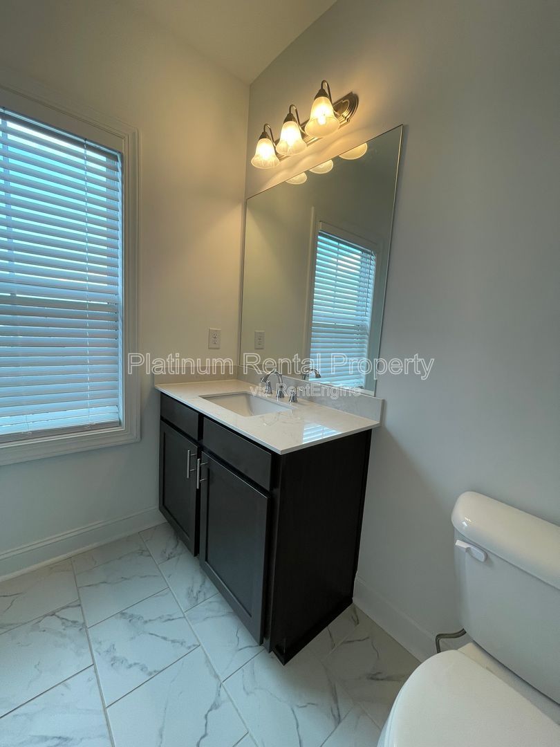 Meticulously maintained and better than new, 3 bedroom, 3.5 bathrooms in FANTASTIC gated Buford neighborhood, by Platinum Property Management Services, Inc. property image