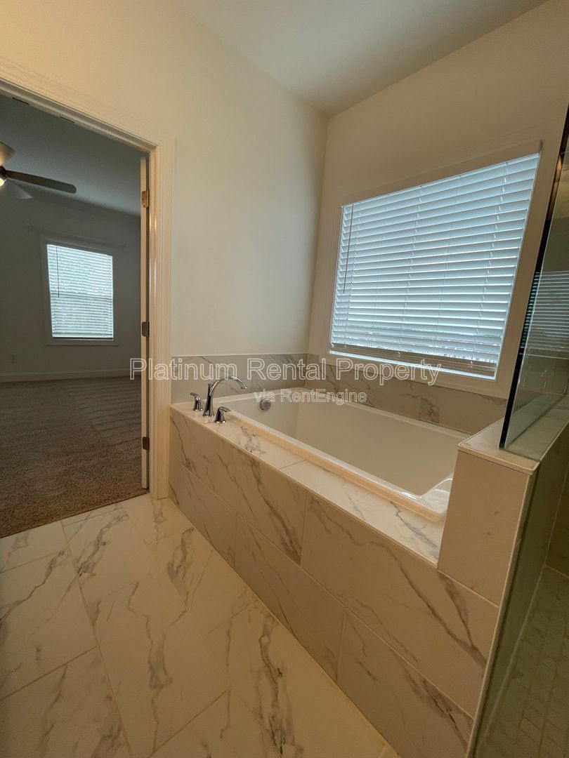 Meticulously maintained and better than new, 3 bedroom, 3.5 bathrooms in FANTASTIC gated Buford neighborhood, by Platinum Property Management Services, Inc. property image