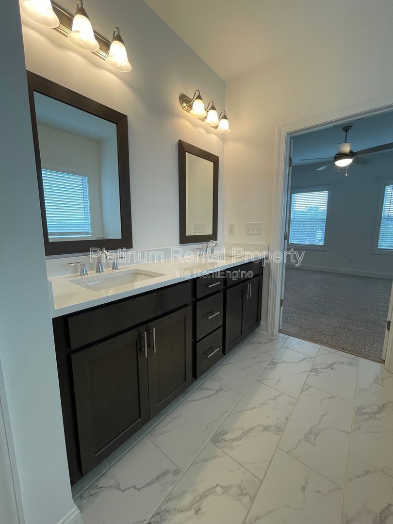 Meticulously maintained and better than new, 3 bedroom, 3.5 bathrooms in FANTASTIC gated Buford neighborhood, by Platinum Property Management Services, Inc. property image