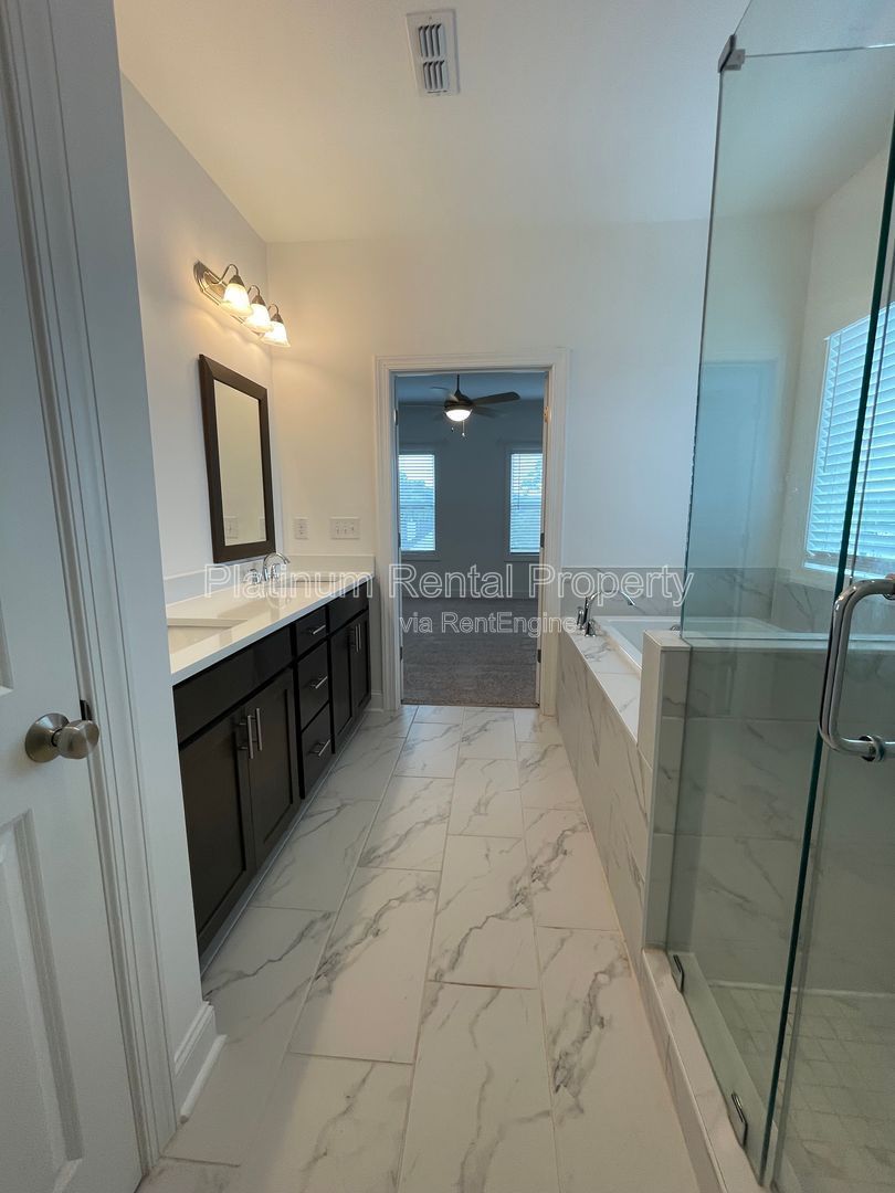 Meticulously maintained and better than new, 3 bedroom, 3.5 bathrooms in FANTASTIC gated Buford neighborhood, by Platinum Property Management Services, Inc. property image