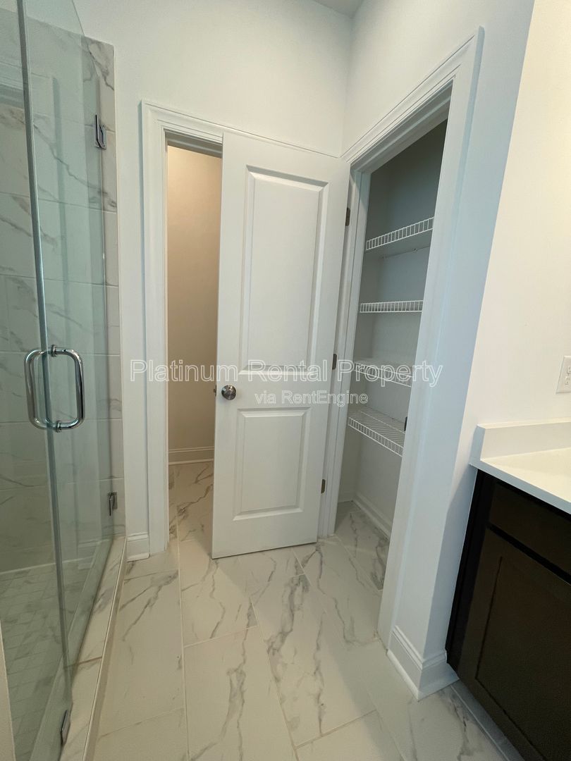 Meticulously maintained and better than new, 3 bedroom, 3.5 bathrooms in FANTASTIC gated Buford neighborhood, by Platinum Property Management Services, Inc. property image