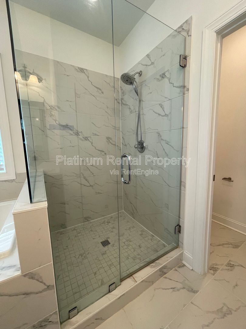 Meticulously maintained and better than new, 3 bedroom, 3.5 bathrooms in FANTASTIC gated Buford neighborhood, by Platinum Property Management Services, Inc. property image