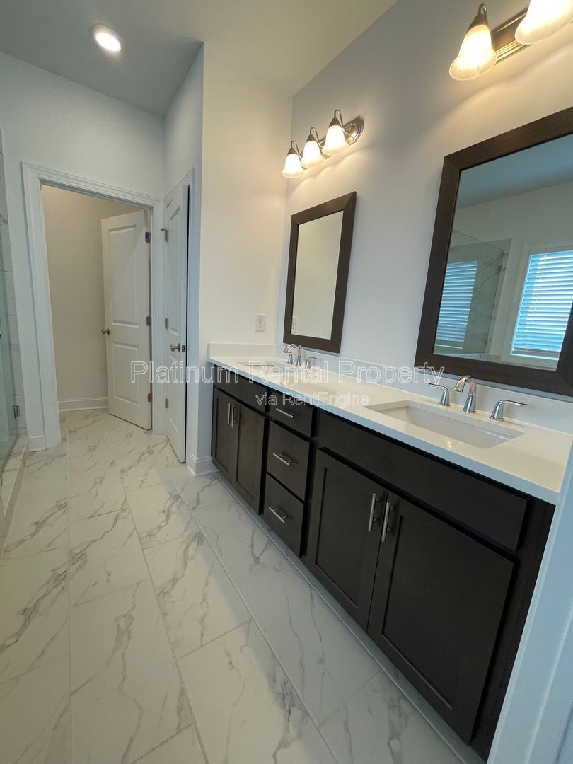 Meticulously maintained and better than new, 3 bedroom, 3.5 bathrooms in FANTASTIC gated Buford neighborhood, by Platinum Property Management Services, Inc. property image