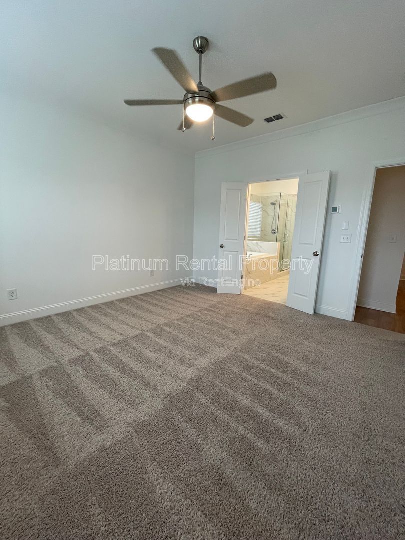 Meticulously maintained and better than new, 3 bedroom, 3.5 bathrooms in FANTASTIC gated Buford neighborhood, by Platinum Property Management Services, Inc. property image
