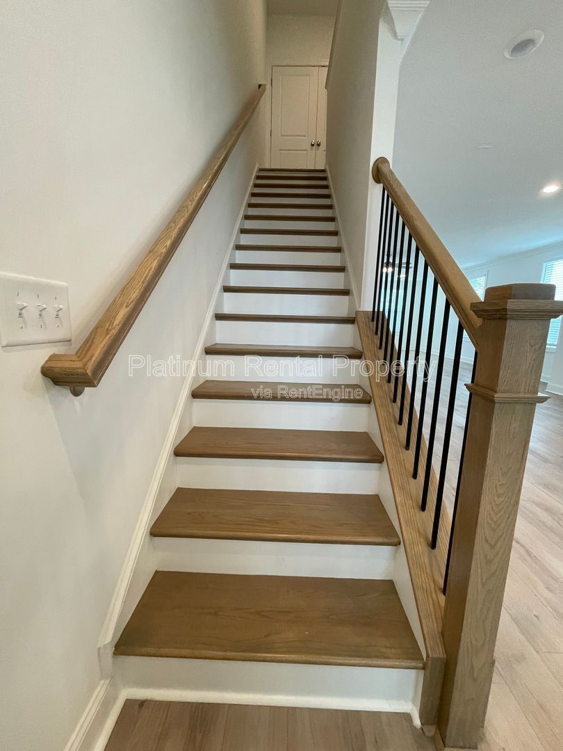 Meticulously maintained and better than new, 3 bedroom, 3.5 bathrooms in FANTASTIC gated Buford neighborhood, by Platinum Property Management Services, Inc. property image