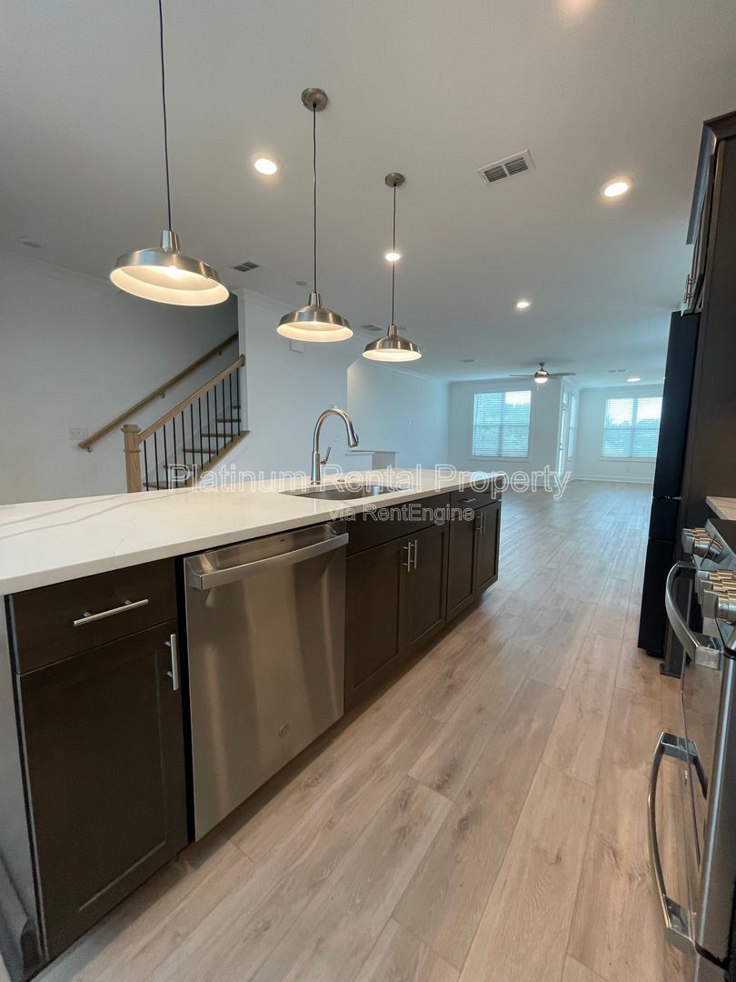 Meticulously maintained and better than new, 3 bedroom, 3.5 bathrooms in FANTASTIC gated Buford neighborhood, by Platinum Property Management Services, Inc. property image