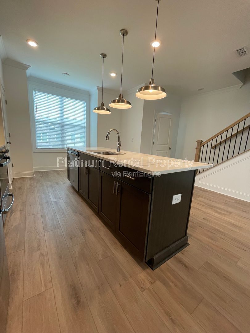 Meticulously maintained and better than new, 3 bedroom, 3.5 bathrooms in FANTASTIC gated Buford neighborhood, by Platinum Property Management Services, Inc. property image