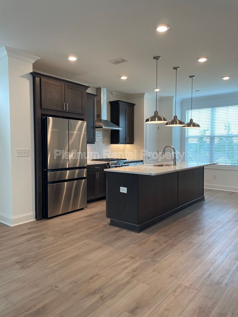 Meticulously maintained and better than new, 3 bedroom, 3.5 bathrooms in FANTASTIC gated Buford neighborhood, by Platinum Property Management Services, Inc. property image