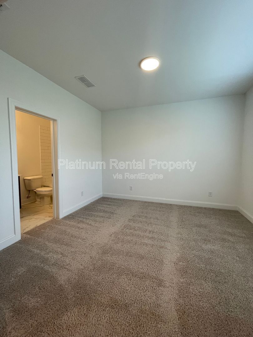 Meticulously maintained and better than new, 3 bedroom, 3.5 bathrooms in FANTASTIC gated Buford neighborhood, by Platinum Property Management Services, Inc. property image