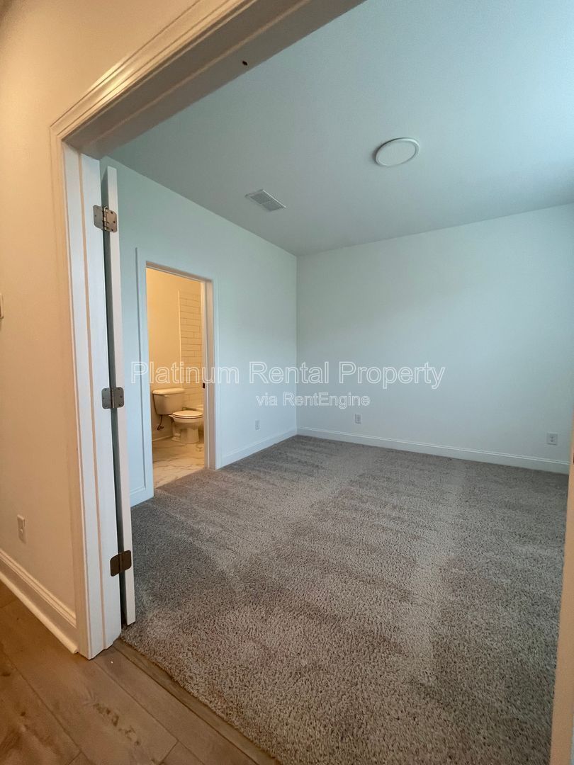 Meticulously maintained and better than new, 3 bedroom, 3.5 bathrooms in FANTASTIC gated Buford neighborhood, by Platinum Property Management Services, Inc. property image