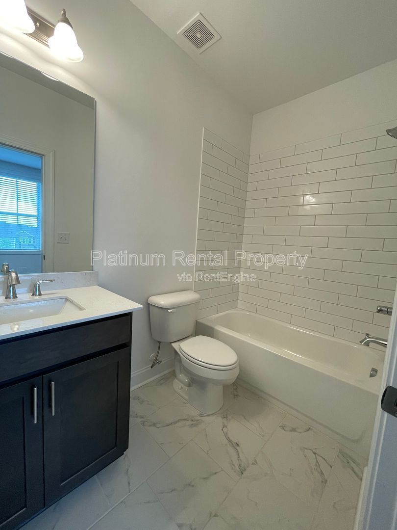 Meticulously maintained and better than new, 3 bedroom, 3.5 bathrooms in FANTASTIC gated Buford neighborhood, by Platinum Property Management Services, Inc. property image