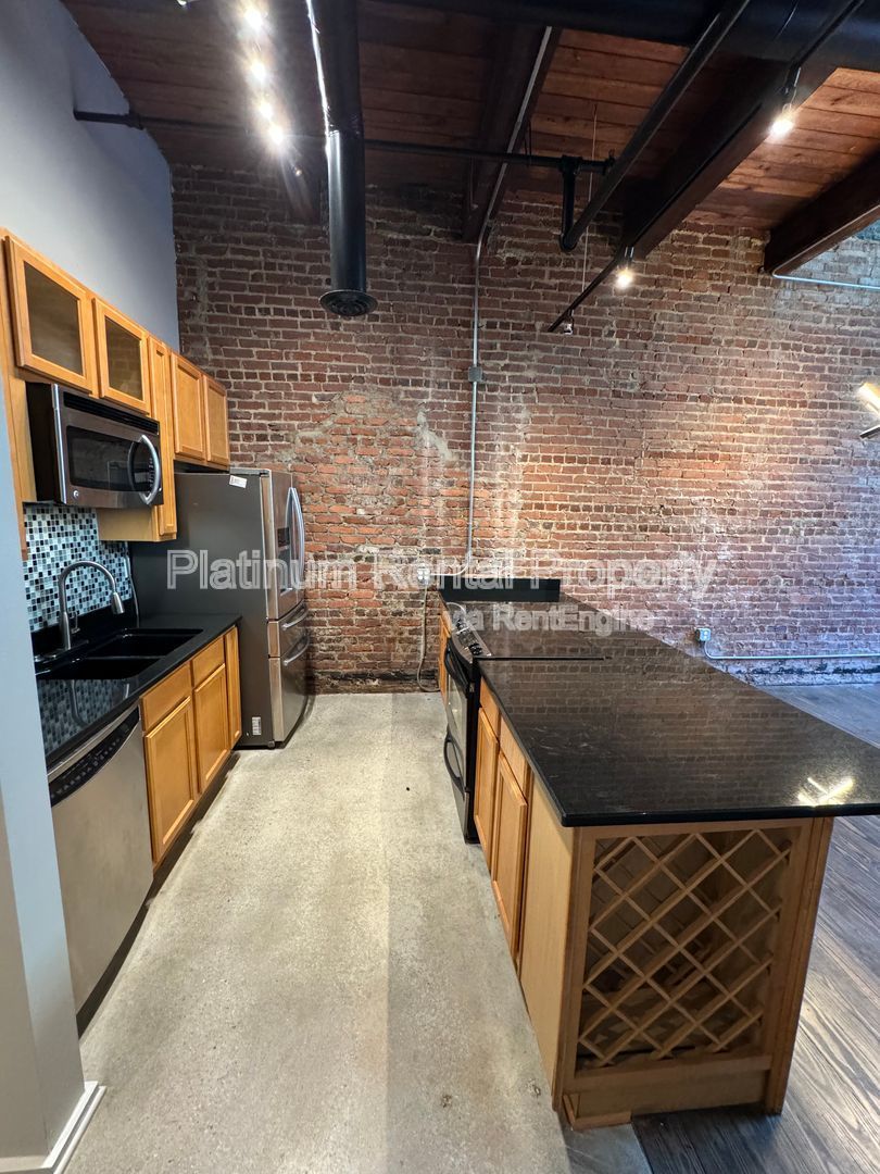 LOCATION, LOCATION, LOCATION! Gorgeous, downtown 2-story 3 bedroom loft in Atlanta by Platinum Property Management Services, Inc. property image