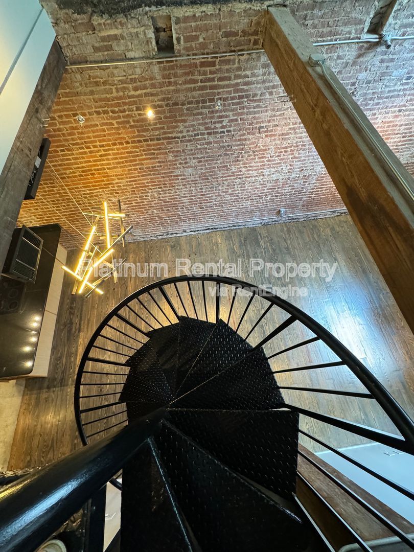 LOCATION, LOCATION, LOCATION! Gorgeous, downtown 2-story 3 bedroom loft in Atlanta by Platinum Property Management Services, Inc. property image