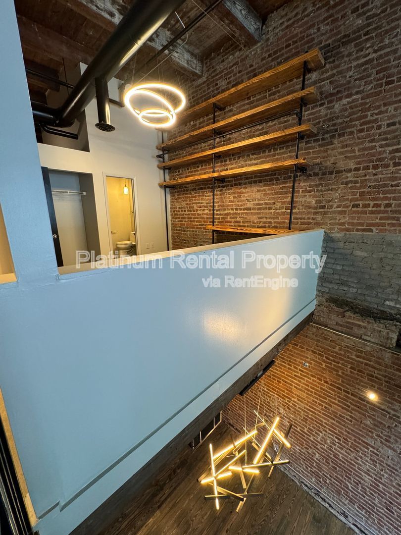 LOCATION, LOCATION, LOCATION! Gorgeous, downtown 2-story 3 bedroom loft in Atlanta by Platinum Property Management Services, Inc. property image