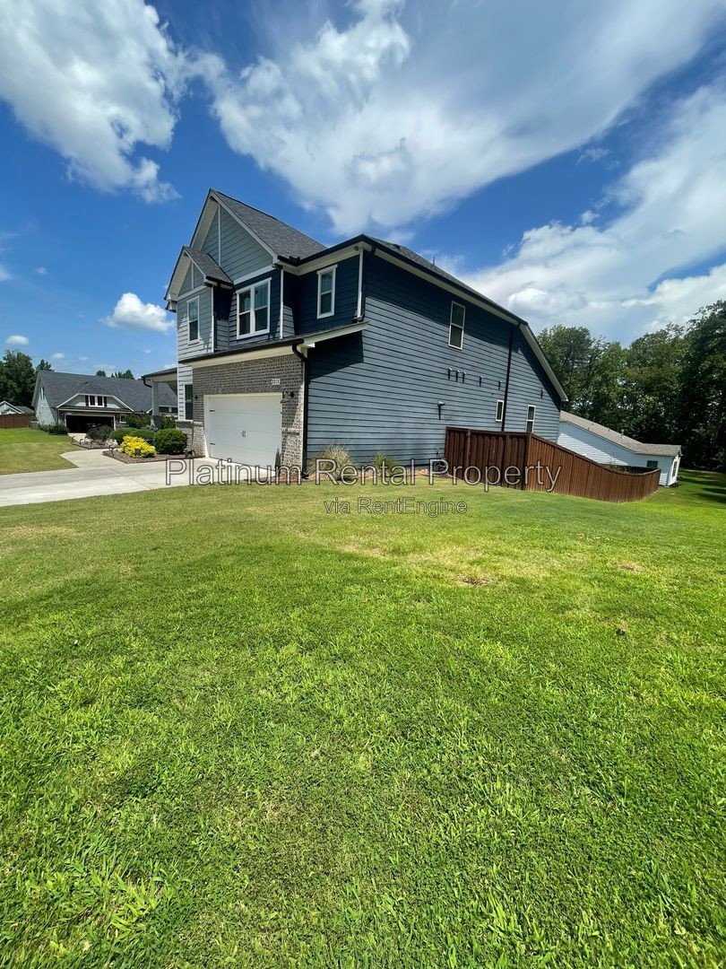 Exquisite 4 bedroom home on full basement in highly sought after Forsyth county neighborhood by Platinum Property Management Services, Inc. property image