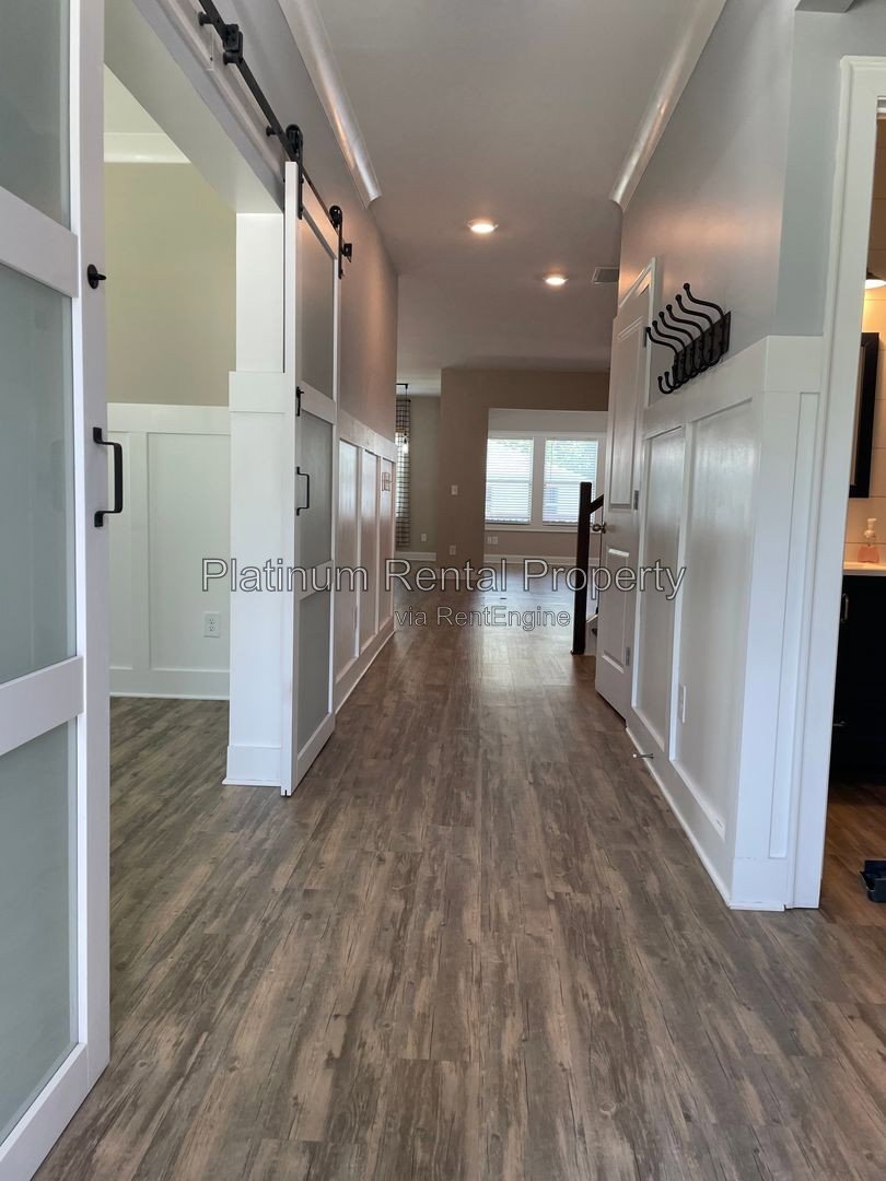 Exquisite 4 bedroom home on full basement in highly sought after Forsyth county neighborhood by Platinum Property Management Services, Inc. property image