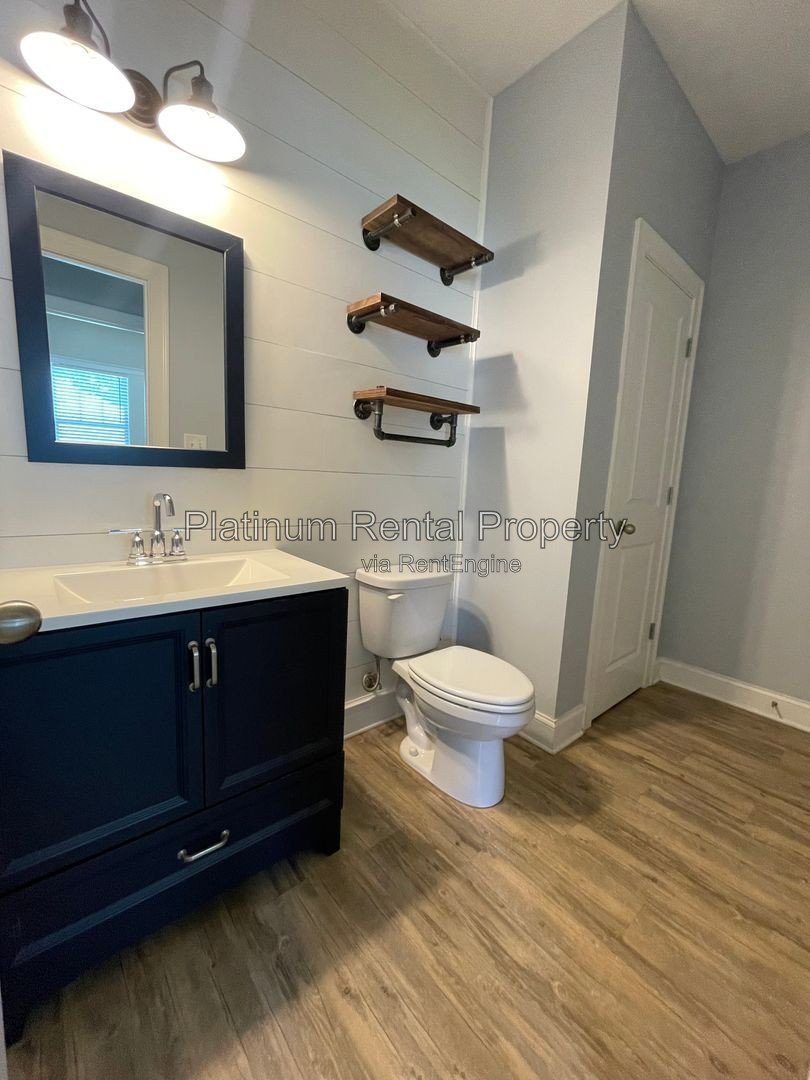 Exquisite 4 bedroom home on full basement in highly sought after Forsyth county neighborhood by Platinum Property Management Services, Inc. property image
