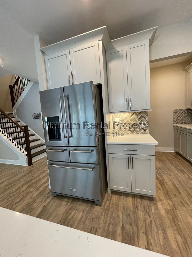 Exquisite 4 bedroom home on full basement in highly sought after Forsyth county neighborhood by Platinum Property Management Services, Inc. property image