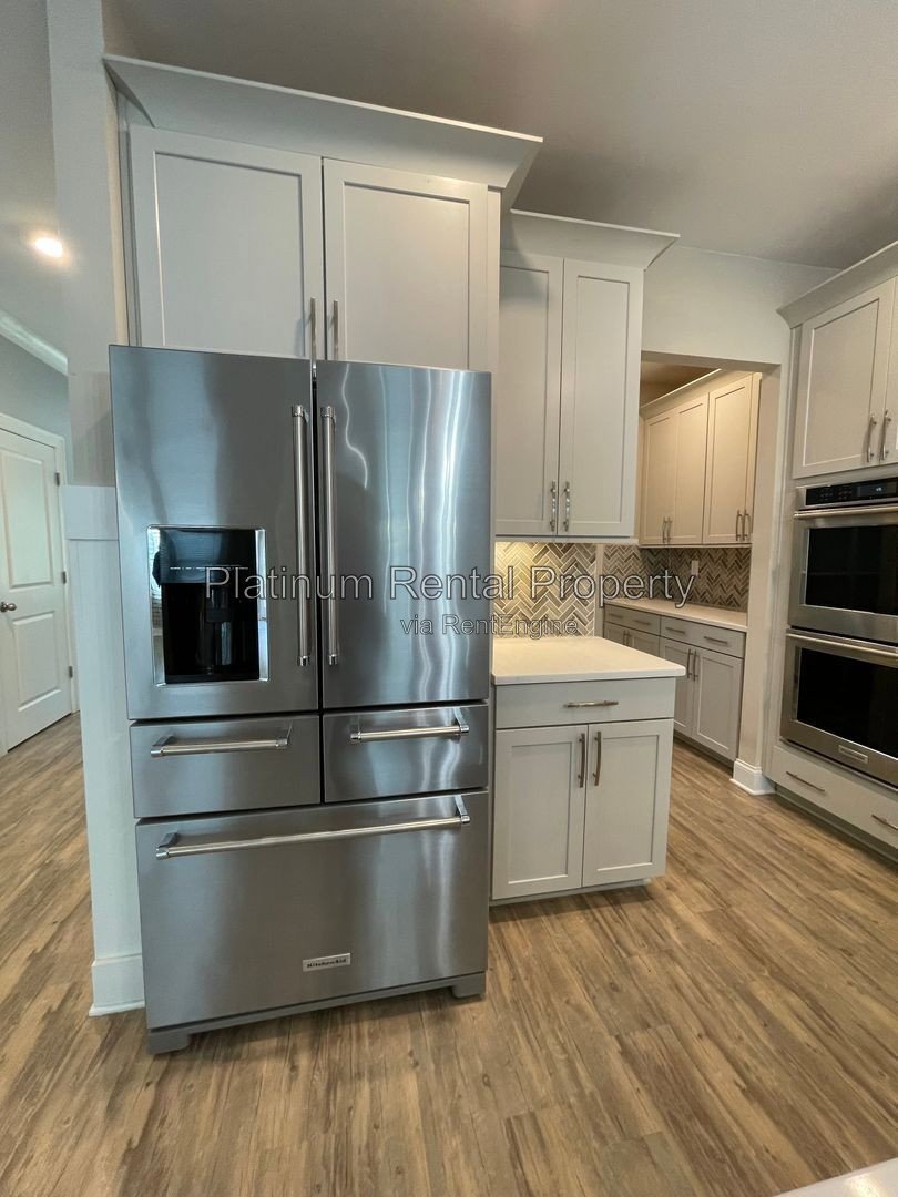 Exquisite 4 bedroom home on full basement in highly sought after Forsyth county neighborhood by Platinum Property Management Services, Inc. property image