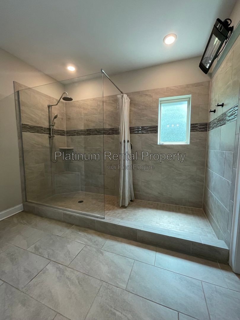 Exquisite 4 bedroom home on full basement in highly sought after Forsyth county neighborhood by Platinum Property Management Services, Inc. property image