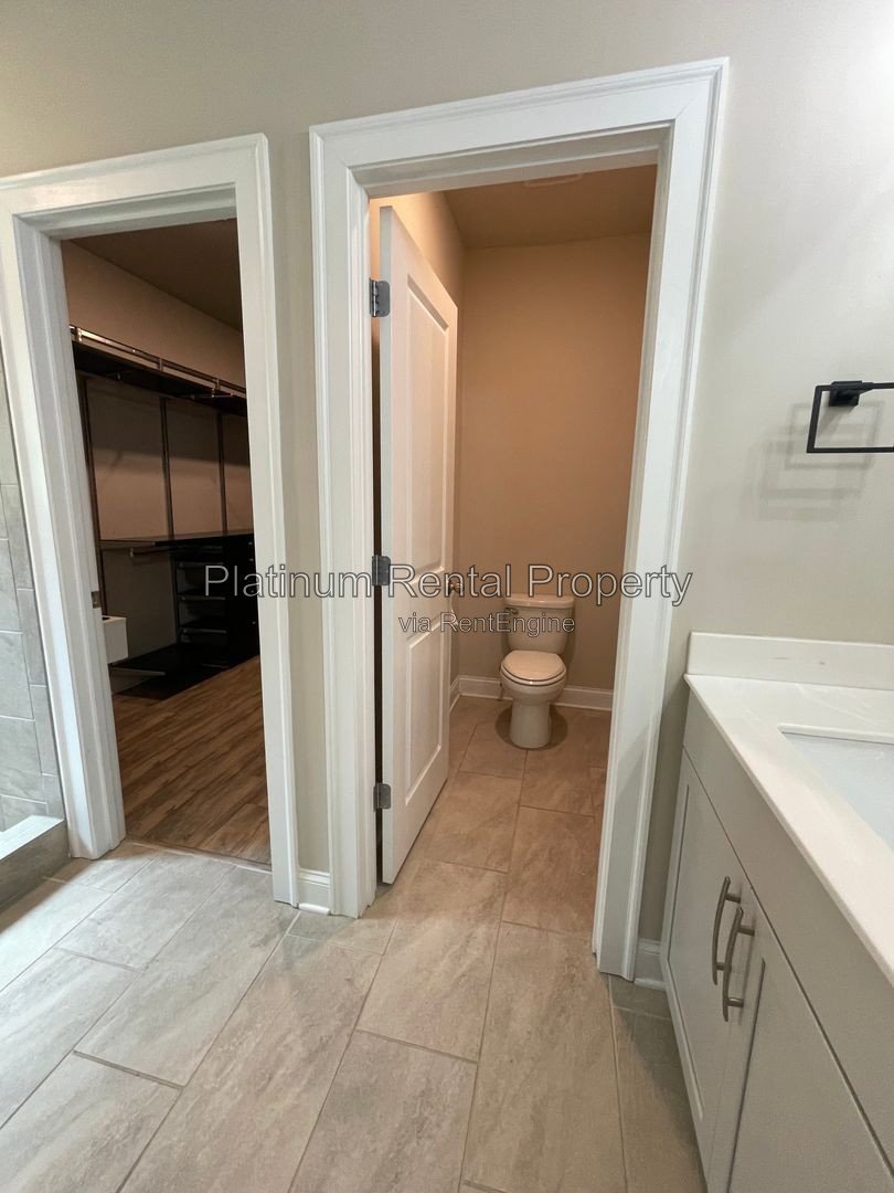 Exquisite 4 bedroom home on full basement in highly sought after Forsyth county neighborhood by Platinum Property Management Services, Inc. property image