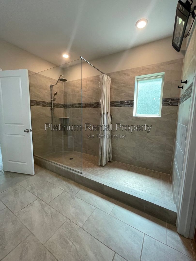 Exquisite 4 bedroom home on full basement in highly sought after Forsyth county neighborhood by Platinum Property Management Services, Inc. property image
