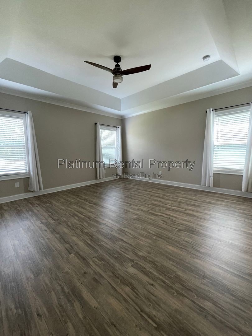 Exquisite 4 bedroom home on full basement in highly sought after Forsyth county neighborhood by Platinum Property Management Services, Inc. property image
