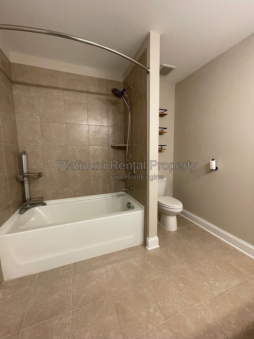 Exquisite 4 bedroom home on full basement in highly sought after Forsyth county neighborhood by Platinum Property Management Services, Inc. property image