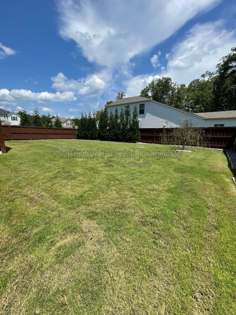 Exquisite 4 bedroom home on full basement in highly sought after Forsyth county neighborhood by Platinum Property Management Services, Inc. property image