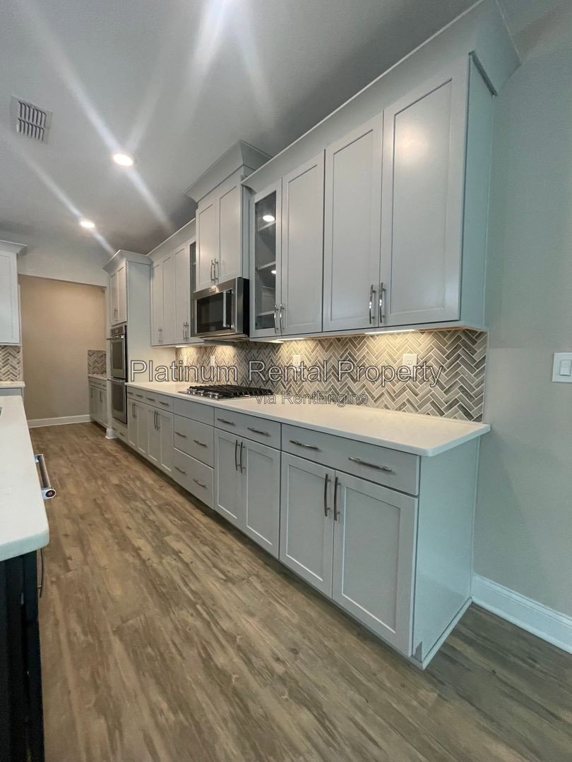 Exquisite 4 bedroom home on full basement in highly sought after Forsyth county neighborhood by Platinum Property Management Services, Inc. property image