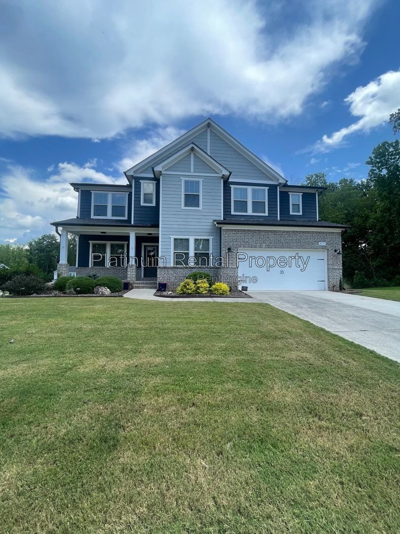 Exquisite 4 bedroom home on full basement in highly sought after Forsyth county neighborhood by Platinum Property Management Services, Inc. property image